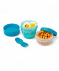 Banana Happy Cup 500 ml snack containers with lid, one filled with hard-boiled eggs, the other with nuts. Includes a blue 2-in-1 fork-spoon.
شوكه و معلقه ، علبه سناكس ، كب زبادى