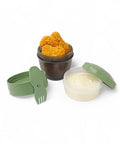BananaHere 500ml snack container with two cups, one for chicken nuggets and one for dip, includes a green lid and fork-spoon.
شوكه و معلقه ، علبه سناكس ، كب زبادى