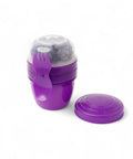 BananaHere 500ml purple snack cup with integrated fork and spoon, filled with blueberries.
شوكه و معلقه ، علبه سناكس ، كب زبادى