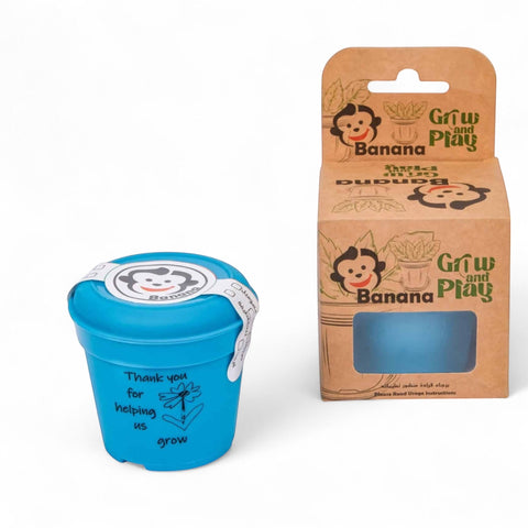 Banana Kids’ Eco-Friendly Gardening Kit in blue recycled PP material with plant pot, drip tray, soil, and seeds.