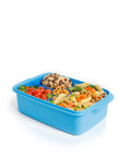 Blue Banana 1.5L lunch box with removable splitter, filled with pasta, vegetables, cherry tomatoes, pretzels, and cookies.